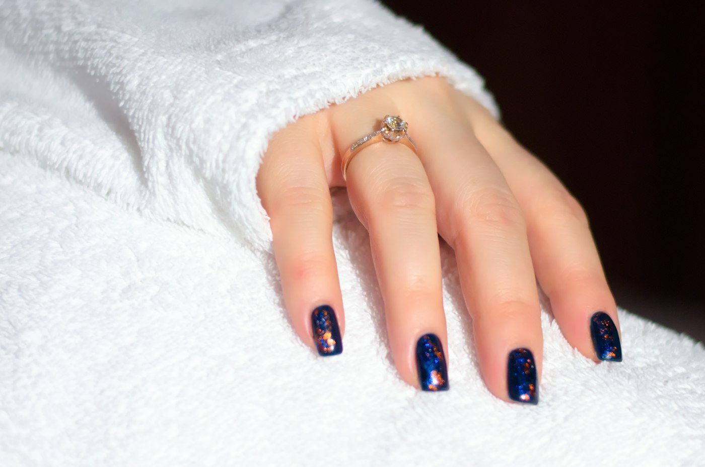 Dark blue glitter gel manicure