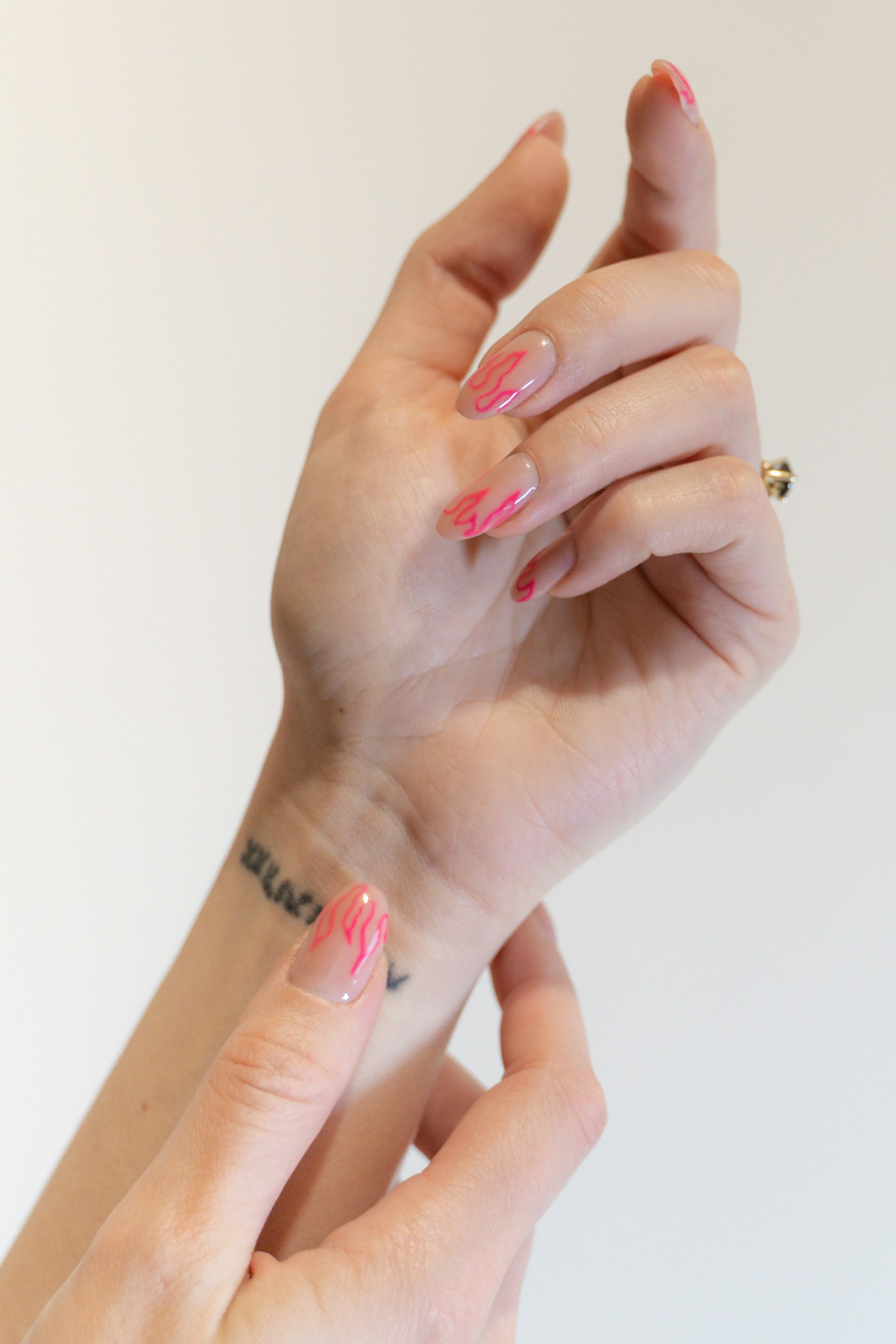 Nude nails with pink line art